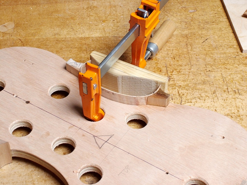 Gluing a C-bout