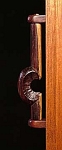 wall hung jewelry cabinet handle detail